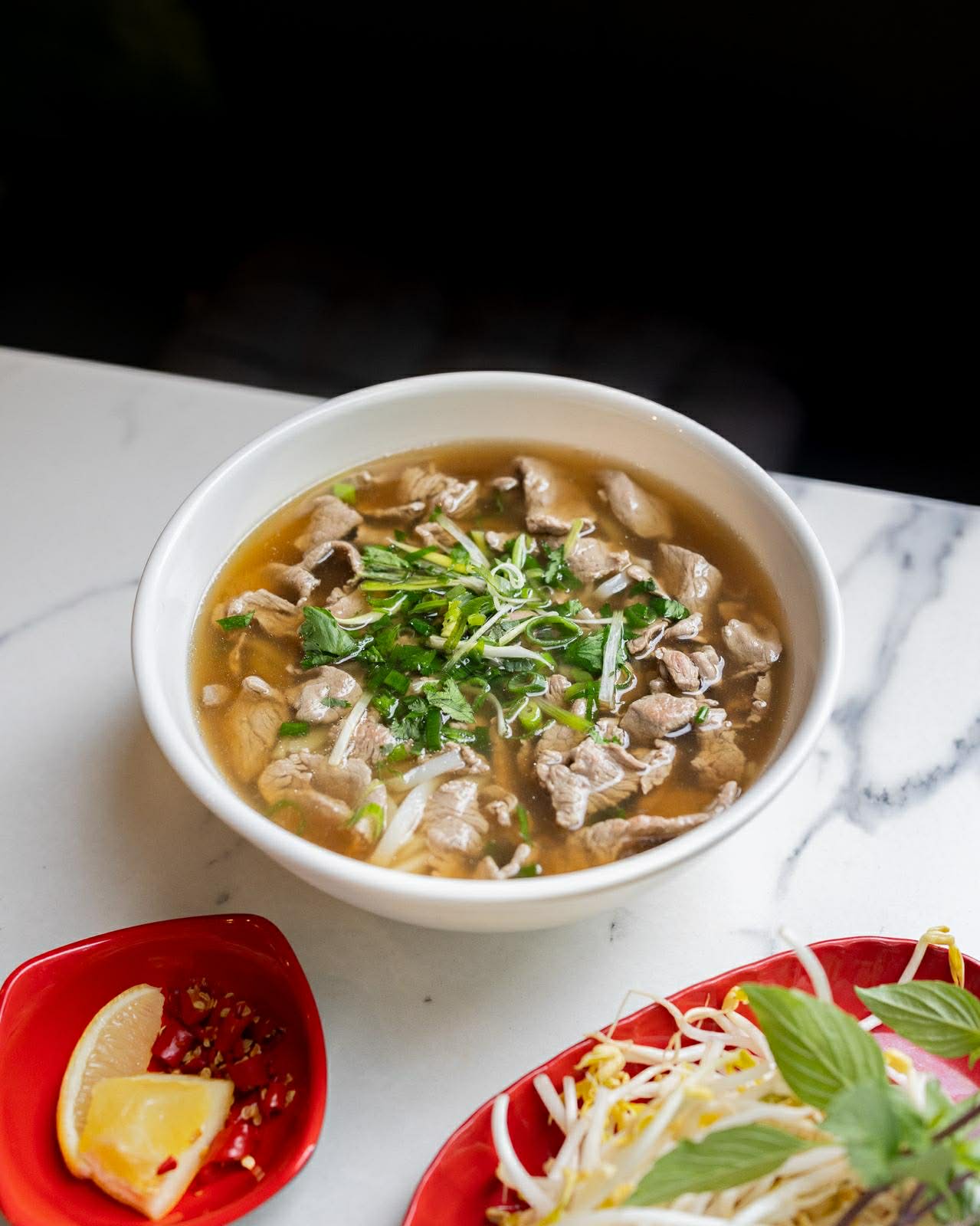 Traditional slow-cooked beef pho noodle soup at Ngon Banh Cuon Melbourne
